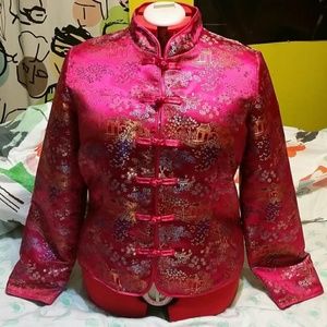 Mandarin collar Chinese style jacket.